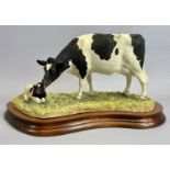 BORDER FINE ARTS FIGURE - Holstein Friesian cow and calf, B0309, 17cms H, boxed