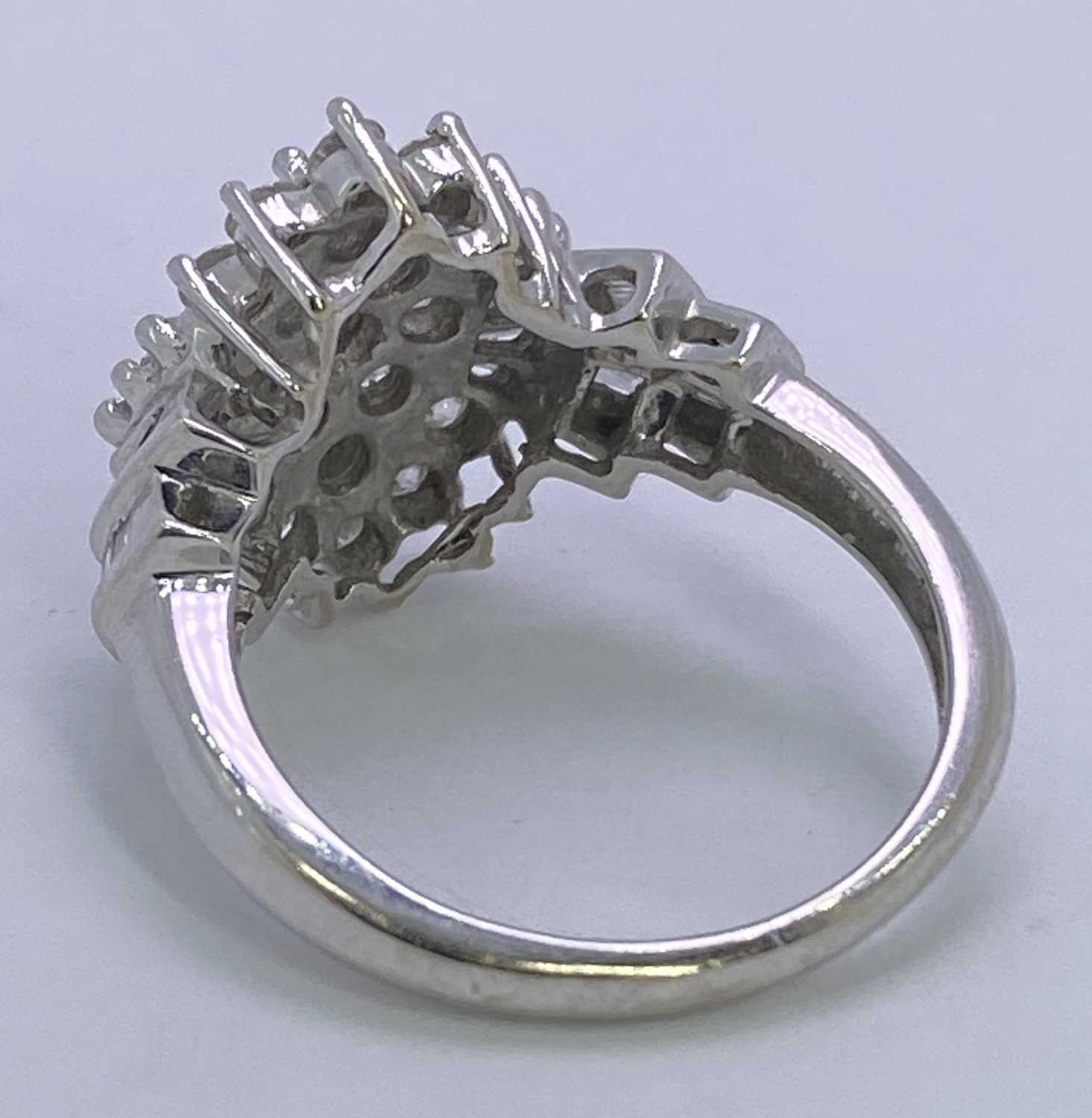 18CT WHITE GOLD DIAMOND CLUSTER RING - having a tiered arrangement of 19 round brilliants and - Image 3 of 4