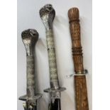 MODERN SAMURAI SWORDS (2) by Ancient Warriors with cobra design handles and lacquered scabbards,