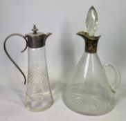 CLARET JUGS (2) - one being conical form with star cut base, hallmarked silver collar and spout,