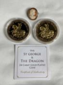 A SMALL CAMEO BROOCH - along with 2 x 1.7cms diameter Jubilee Mint George and Dragon 25p