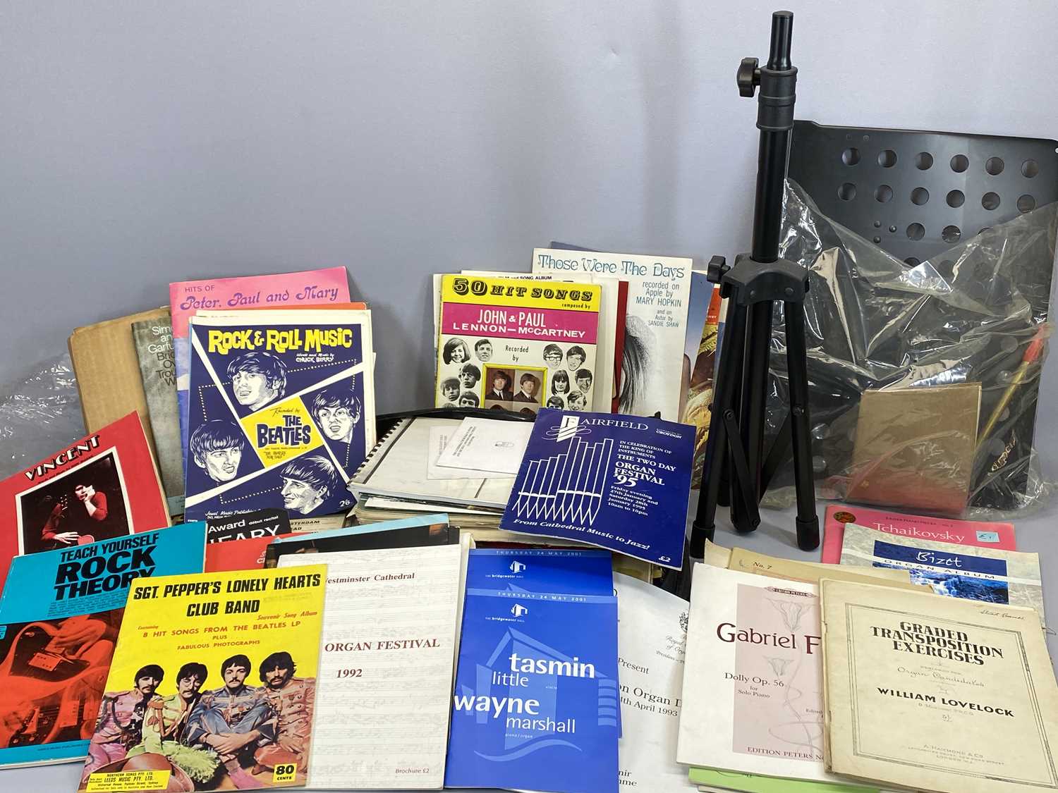 BOOKS - large quantity of sheet music, Classical and Rock & Roll with a metal music stand and box