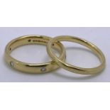 18CT GOLD WEDDING BANDS (2) - to include a plain example, Size mid Q-R, and a wider band example