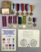 VICTORIA & LATER MIXED UNMARKED MEDALS GROUP - 12 items to include a WW2 group of four with awards