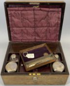 RECTANGULAR ROSEWOOD LADY'S TRAVELLING DRESSING CASE - the hinged cover inset with a mother of pearl
