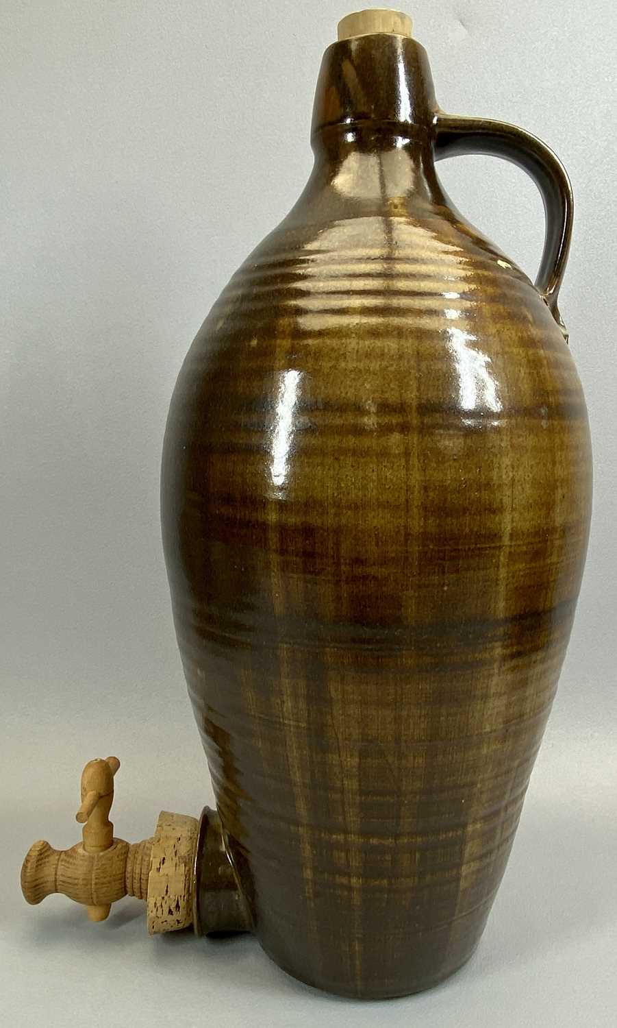 STUDIO POTTERY FLAGON - of ribbed ovoid form with side handle, brown drip glazed with stopper and - Image 2 of 2