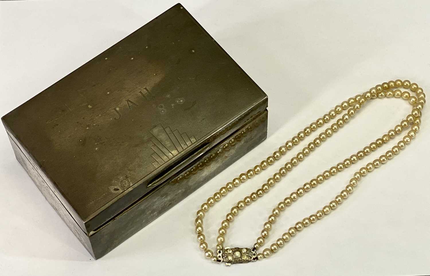 SILVER CIGARETTE BOX and a two strand simulated pearl necklace, London 1932, Maker Padgett &