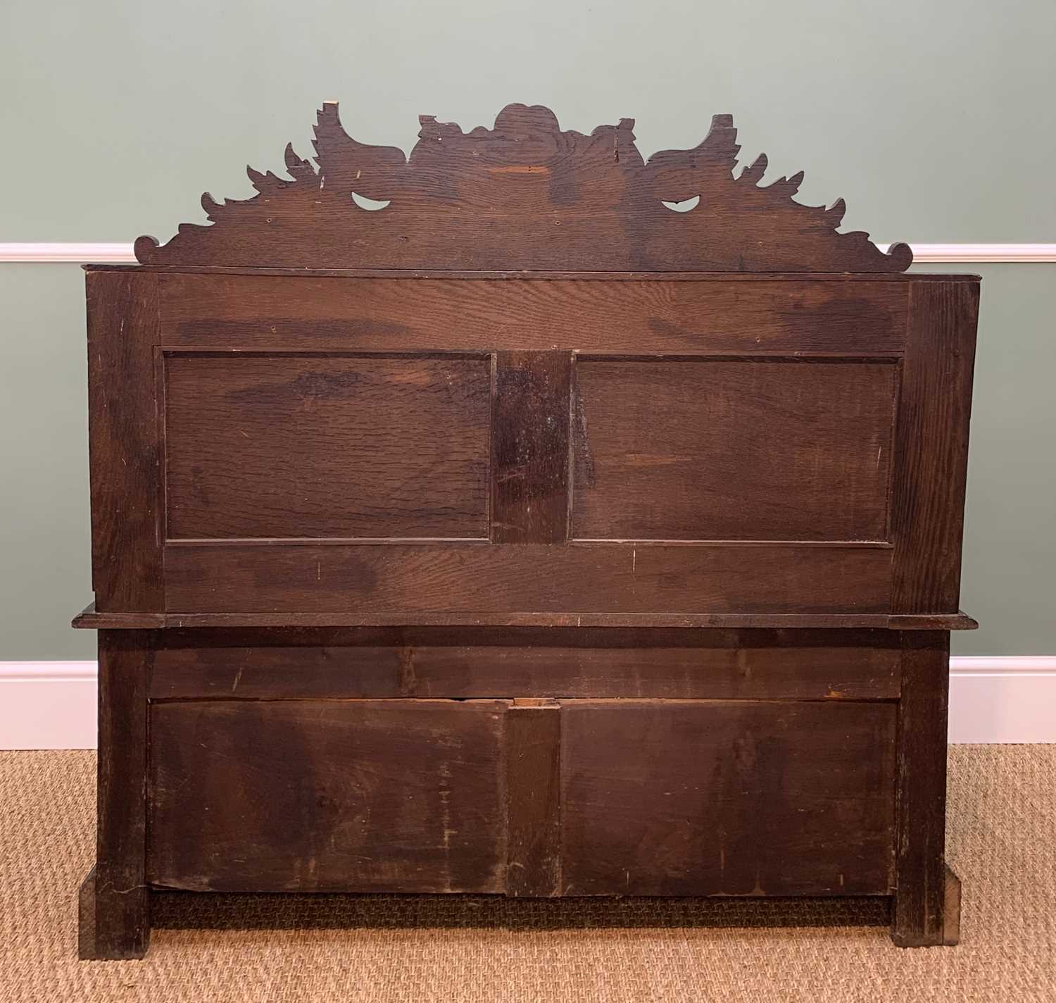 STAINED OAK BOX SETTLE, carved in the Renaissance revival style with Griffin and mask panelled back, - Image 6 of 13