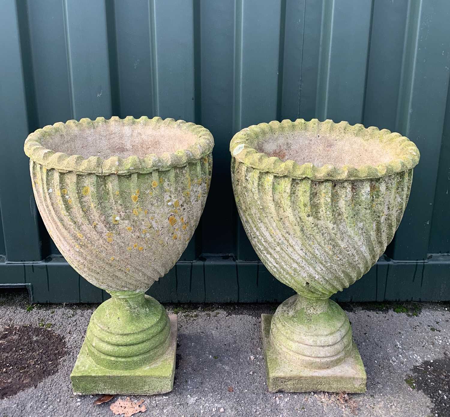 GARDEN ORNAMENTS: comprising pair composition stone shank fluted urns on socle bases, 66cm h (2) - Image 2 of 2