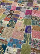 INDIAN EMROIDERED BEDSPREAD HANGING, composed of patchwork pieces from highly decorated saris