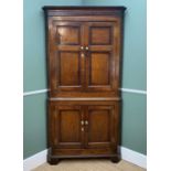 19TH CENTURY NORTH WALES OAK STANDING CORNER CUPBOARD, with mahogany crossbanding and barber's