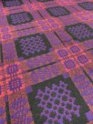 TRADITIONAL WELSH TAPESTRY BLANKET, of geometric reversible design, pink ground with purple and