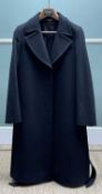 DESIGNER CLOTHING: a Jaeger black cashmere winter coat (UK14) Provenance: The estate of Eileen Price