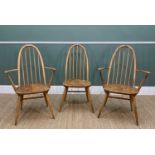 THREE ERCOL PALE ELM QUAKER WINDSOR DINING CHAIRS, including two armchairs, (3) Comments: seats