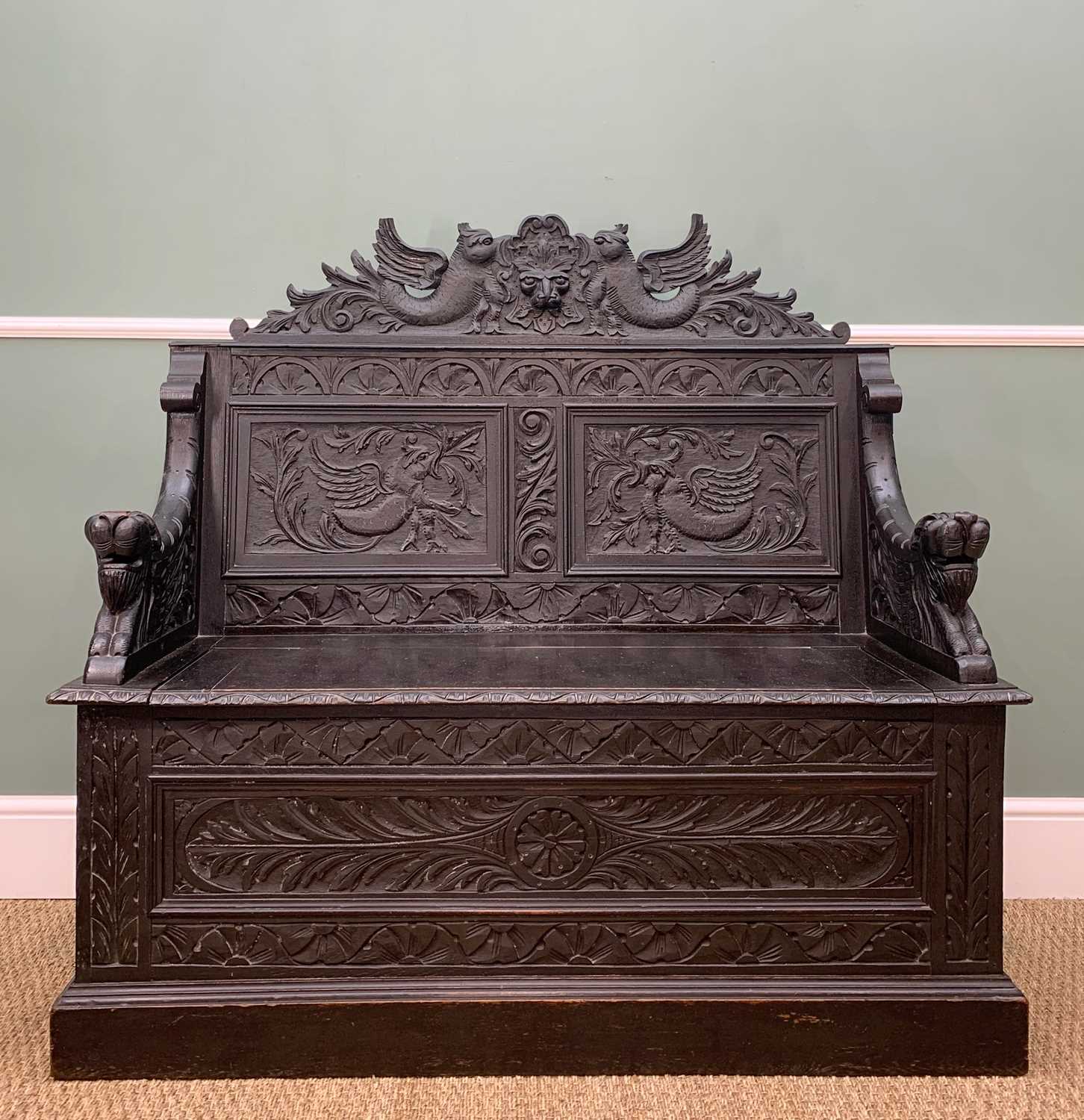 STAINED OAK BOX SETTLE, carved in the Renaissance revival style with Griffin and mask panelled back, - Image 2 of 13