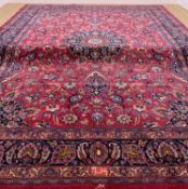MESHED CARPET, navy blue medallion and spandrels, scrolling palmette pink/red field, double