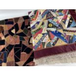 TWO PATCHWORK CLOTHS, comprising a silk floral square quilted cloth with lacework border,