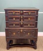 17TH CENTURY OAK GEOMETRIC FRONTED TWO PART CHEST ON STAND, fitted three graduated long drawers on a