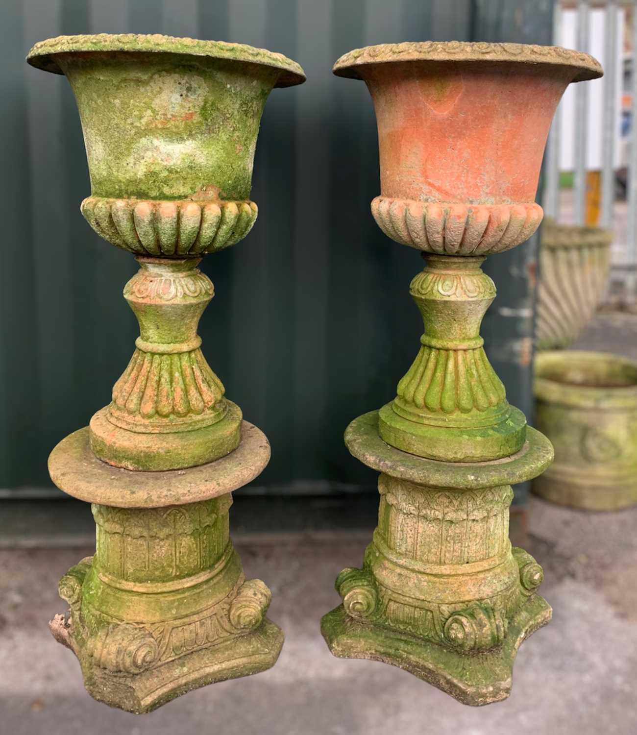 PAIR TERRACOTTA GARDEN URNS ON STANDS, 109cm h (2) Comment: one cracked.