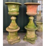 PAIR TERRACOTTA GARDEN URNS ON STANDS, 109cm h (2) Comment: one cracked.