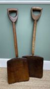 TWO ANTIQUE MALT SHOVELS, with characteristic broad blades and D-shaped handles, 94 and 95cm long (