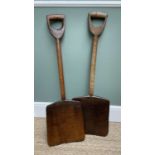 TWO ANTIQUE MALT SHOVELS, with characteristic broad blades and D-shaped handles, 94 and 95cm long (