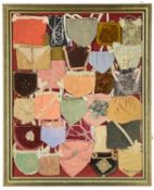 FRAMED COLLECTION OF EISTEDDFOD 'PURSES', early 20th century, various colours and shapes mounted