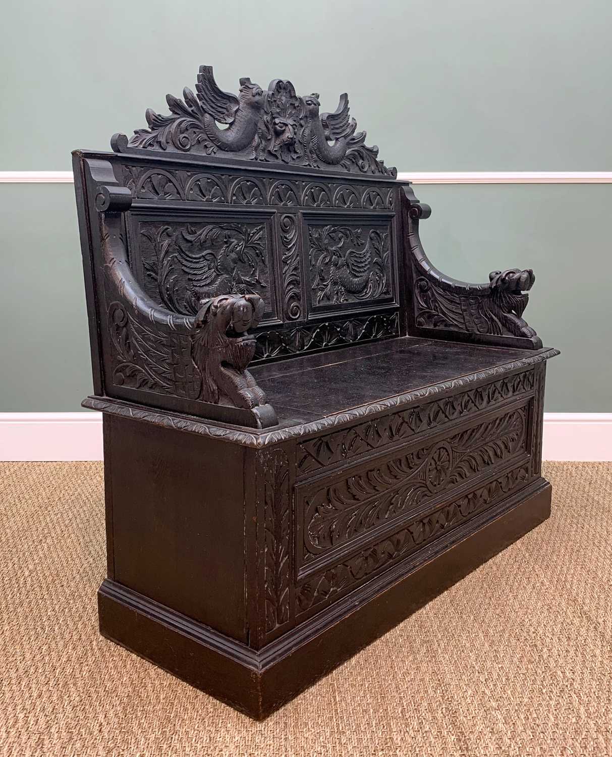 STAINED OAK BOX SETTLE, carved in the Renaissance revival style with Griffin and mask panelled back, - Image 3 of 13