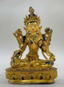 SINO-TIBETAN OR NEPALESE GILT BRONZE FIGURE OF GREEN TARA, seated in dhyanasana on lotus pedestal,