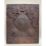 TIBETAN COPPER MANDALA PLAQUE, 20th Century, repousse-decorated with a seated bodhisattvas above
