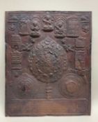 TIBETAN COPPER MANDALA PLAQUE, 20th Century, repousse-decorated with a seated bodhisattvas above