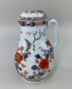 CHINESE IMARI PORCELAIN JUG & COVER, Kangxi, of baluster form with shallow domed cover, loop