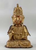 CHINESE LACQUERED GILT BRONZE FIGURE OF GUANYIN, Late Ming dynasty, the serene boddhisattva seated