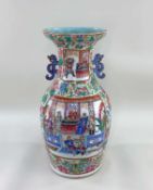 CANTON FAMILLE ROSE PORCELAIN VASE, 19th Century, painted with four panels depicting manchu warriors