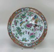 CANTONESE FAMILLE ROSE PORCELAIN DISH, 19th Century, the well painted with scattered floral