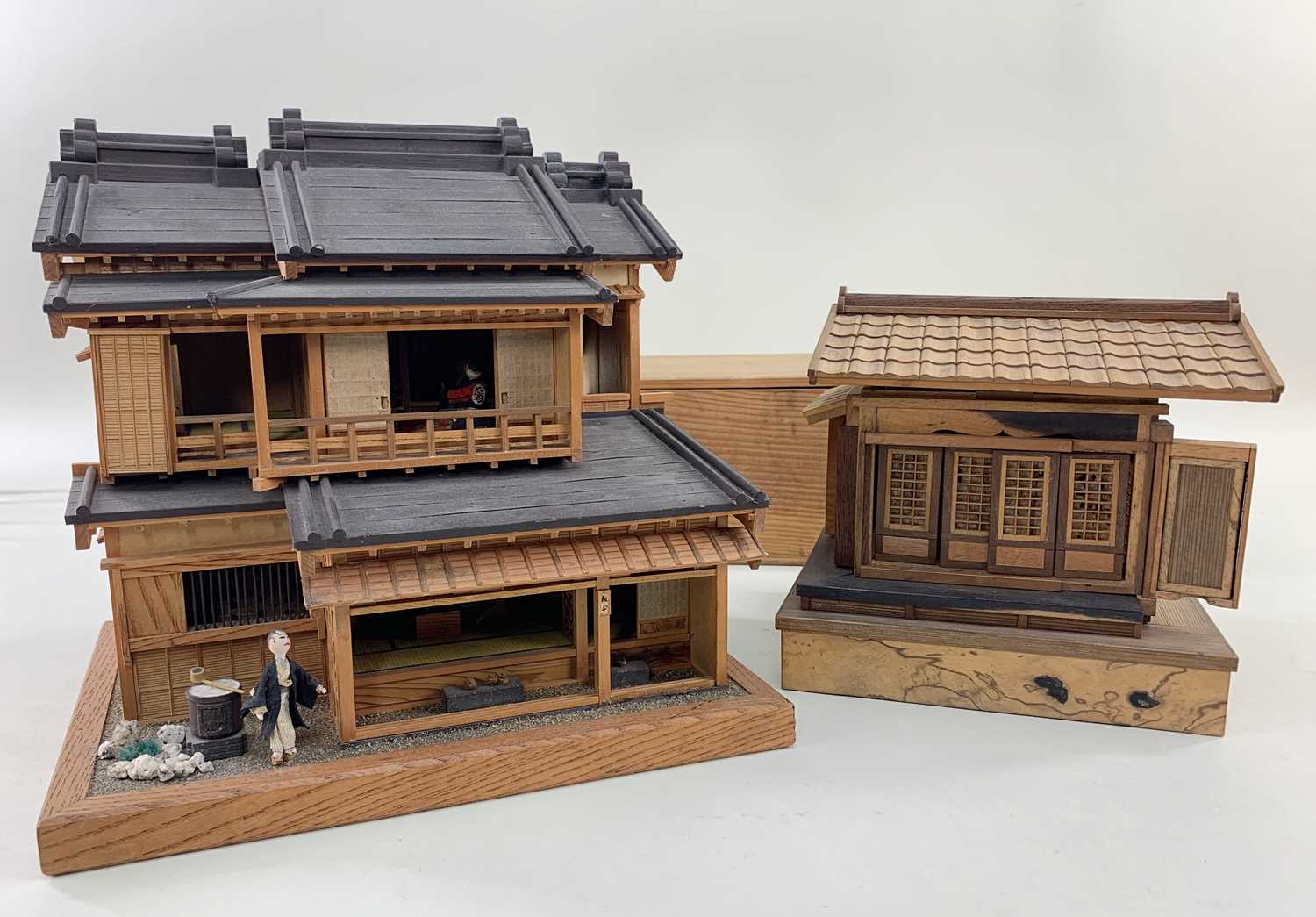 TWO JAPANESE MODELS OF HOUSES, late 20th Century, one of two stories with fitted interiors of