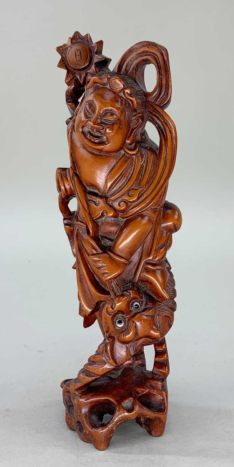 FIVE CHINESE WOOD CARVINGS, comprising boxwood figure of Liu Hai seated on rock with the three - Image 4 of 7