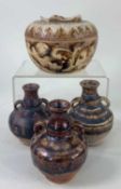 THAI SWANKALOK STONEWARE BOX & THREE OIL BOTTLES, 14th-16th Century, the circular box of persimmon