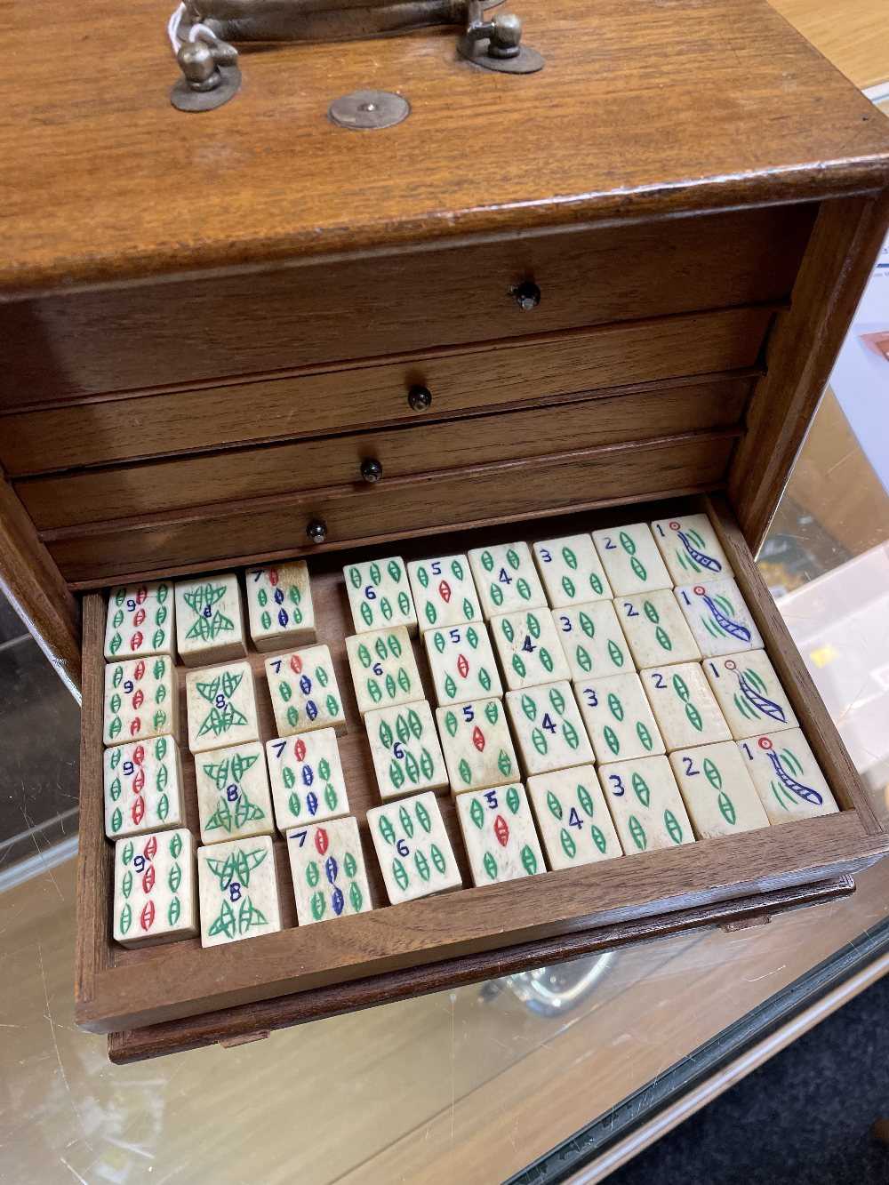 CHINESE EXPORT MAH JONG SET, bone & bamboo tiles carved and stained in colours, in hardwood box with - Image 10 of 12