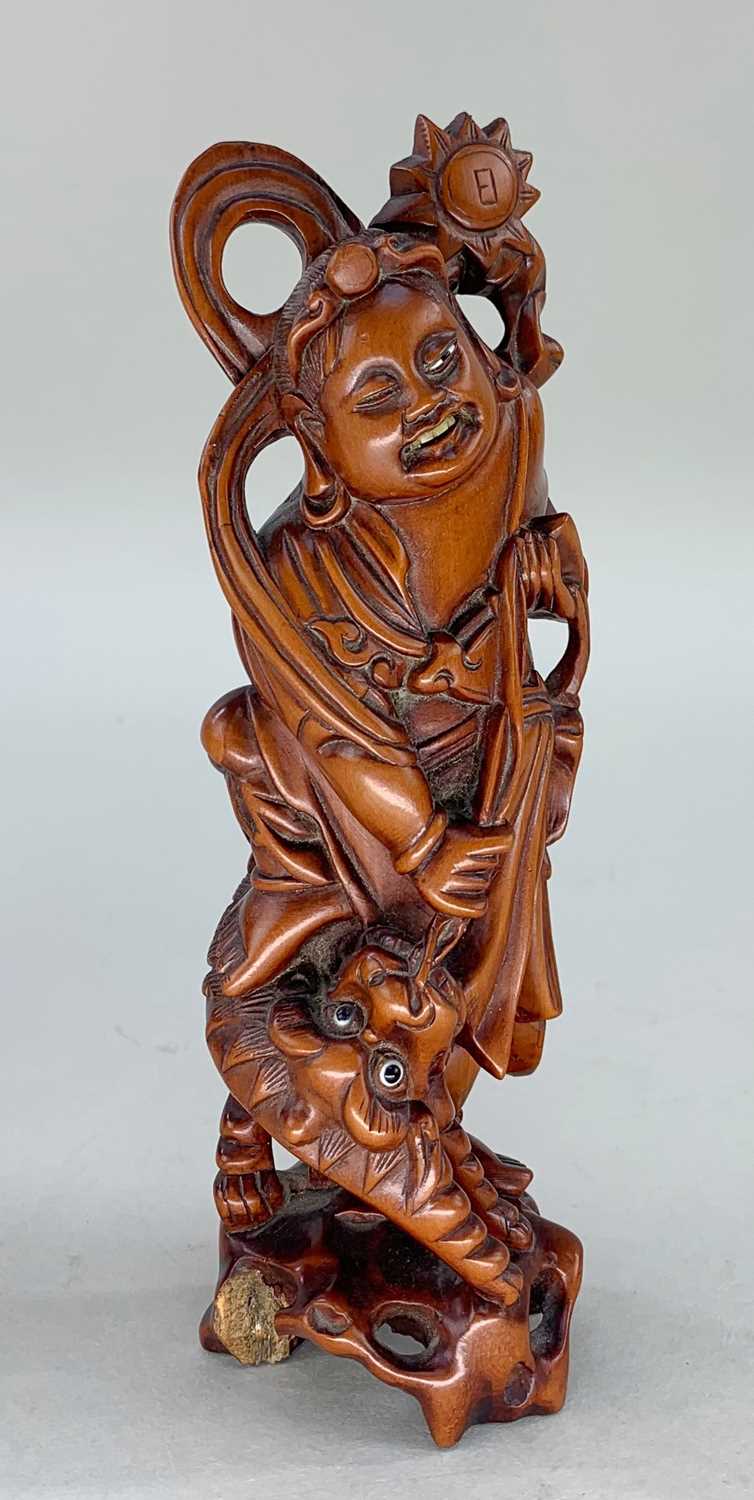 FIVE CHINESE WOOD CARVINGS, comprising boxwood figure of Liu Hai seated on rock with the three - Image 5 of 7