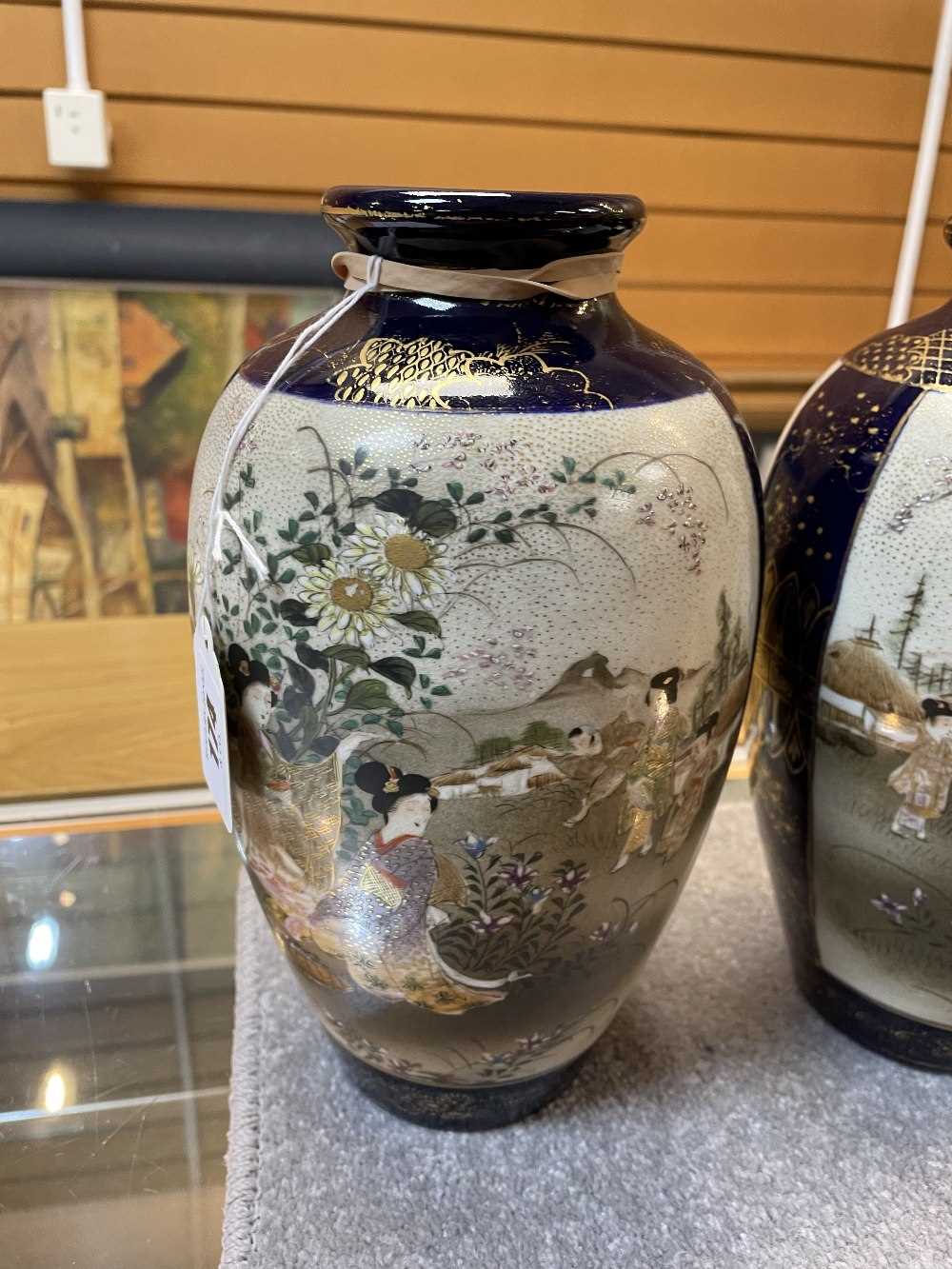 PAIR OF JAPANESE SATSUMA EARTHENWARE VASES, Meiji/Taisho Period, painted with two large panels of - Image 6 of 11