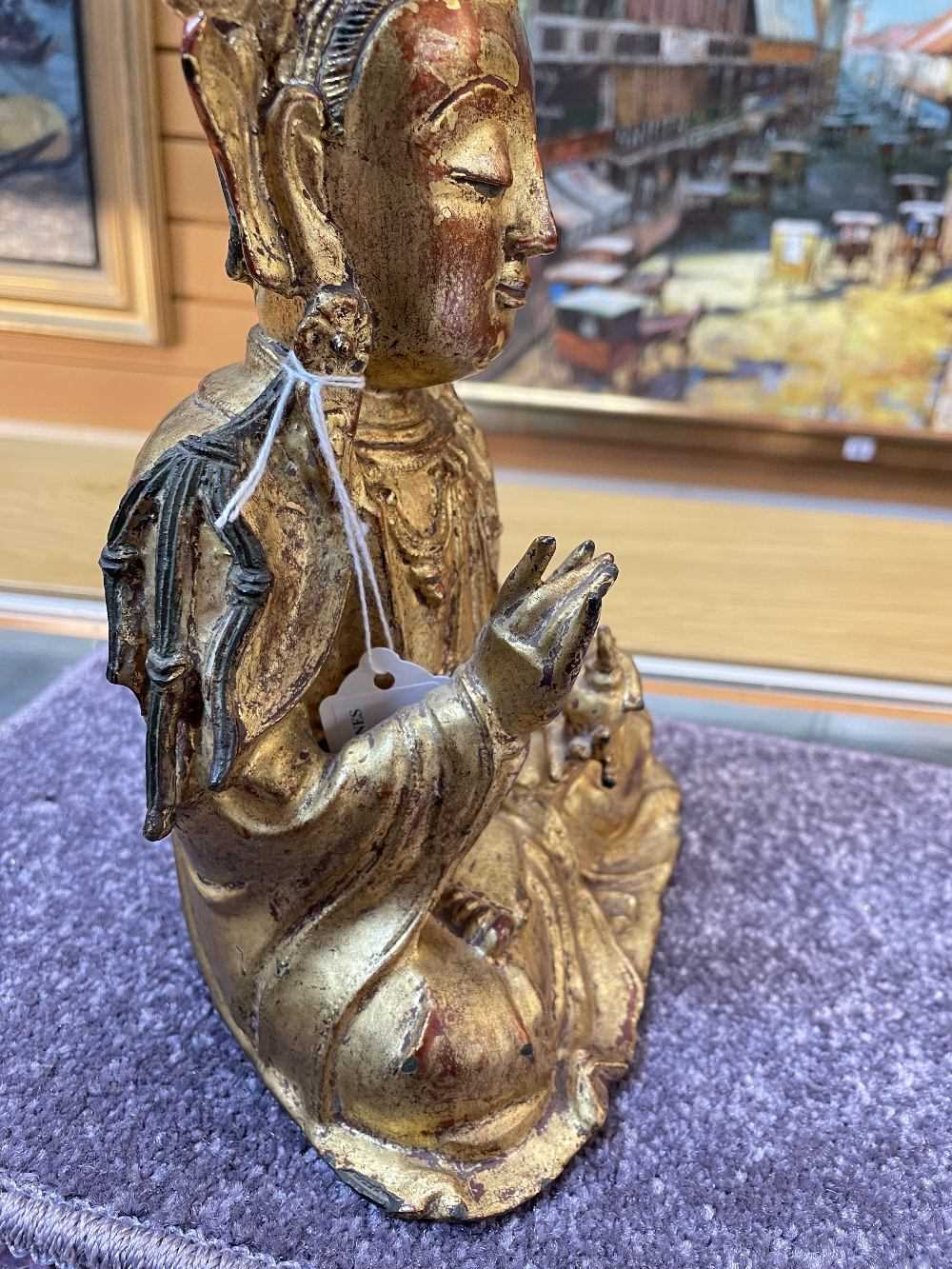 CHINESE LACQUERED GILT BRONZE FIGURE OF GUANYIN, Late Ming dynasty, the serene boddhisattva seated - Image 16 of 20
