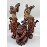 FIVE CHINESE WOOD CARVINGS, comprising boxwood figure of Liu Hai seated on rock with the three
