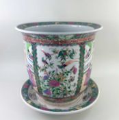 MODERN CHINESE FAMILLE ROSE JARDINIERE AND SAUCER, painted in the Canton style with figures,
