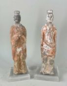 TWO CHINESE GREY POTTERY MODELS OF OFFICIALS, Northern Wei Dynasty style, wearing cap headdress