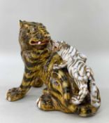 JAPANESE KUTANI PORCELAIN MODEL OF TIGERS, 20th Century, one large amber tiger seated with smaller