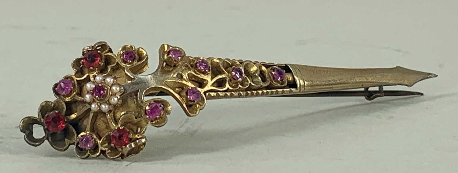 SRI LANKAN KONDAKOORA PIN, silver gilt and set with mine-cut rubies, seed pearls and other stones,