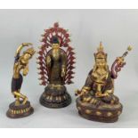 THREE MODERN NEPALESE FIGURES, parcel gilt copper, including seated Guru Rinpoche (Padmasambhava)