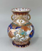 JAPANESE KORANSHA IMARI PORCELAIN VASE, Meiji Period, painted with stylised tsuru to the waisted