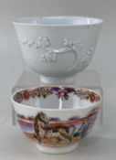 TWO CHINESE PORCELAIN BOWLS, comprising a blanc de chine bowl, outside applied with a sprig of